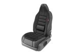 Black car seat with a backrest and seat cushion, featuring textured fabric and an adjustable lumbar support.