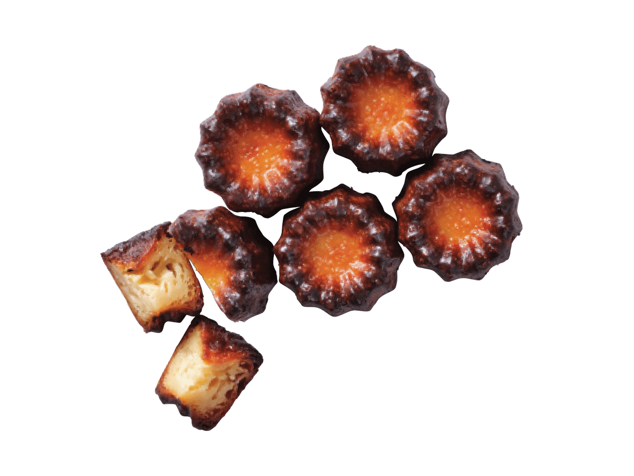 Kuus karamelliseeritud koorikuga canelé'd, millest kaks on pooleks lõigatud.