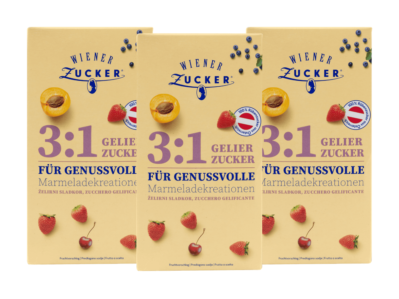 Drei Packungen Gelierzucker 3:1 mit Abbildungen von Aprikosen, Erdbeeren, Kirschen und Heidelbeeren.