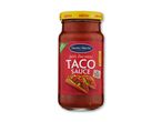 Glas med medium stærk tacosauce med fine stykker og ingen tilsat sukker.