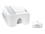 White paper trimmer with a ruler and grid, next to a white corner rounder.