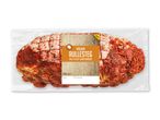 Indpakket kalkunrullesteg med champignonfyld og rød marinade, mærket 'SPOT' og '1000 ge'.