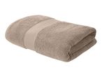 Folded beige bath towel with a ribbed band
