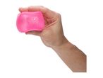 A hand holds a pink Nee Doh stress ball.
