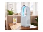 White air purifier with blue light on a wooden table next to a glass of lemonade in a living room.
