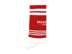 Red and white striped athletic sock with 'GRASS SPORT' text.