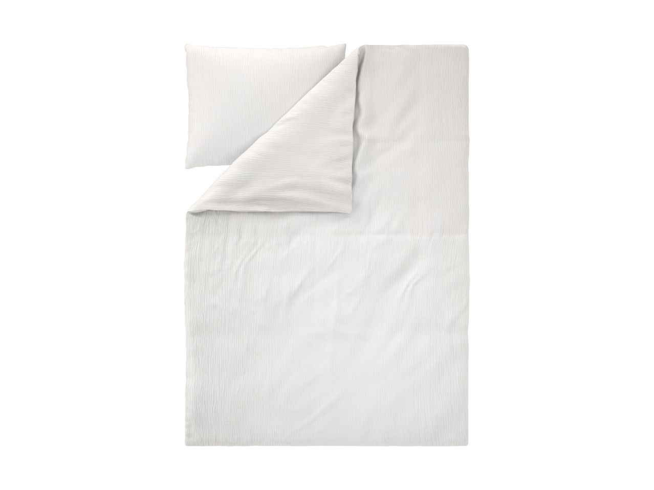 White duvet cover set with a pillowcase, made of textured fabric.