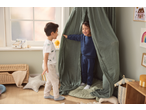 Two boys playing in a kids' room, one wearing a Lupilu T-shirt with dinosaurs.