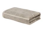 Folded light brown towel with textured stripes