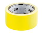 A roll of yellow 3M tape with company information printed on the core.