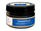 Japanese style seaweed pearls, a vegan alternative to caviar, in a small glass jar.