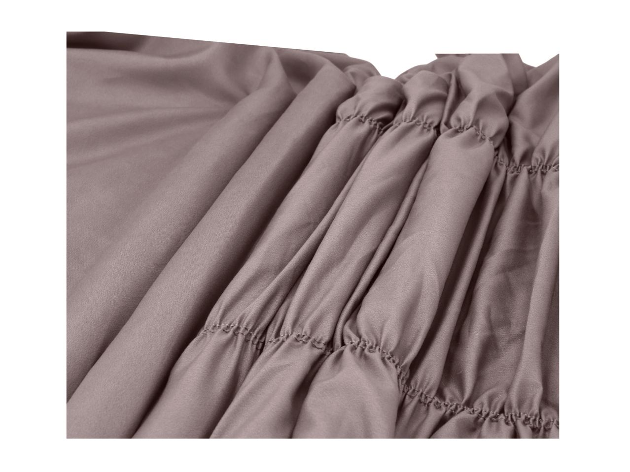 Close-up of gathered fabric with elasticated stitching