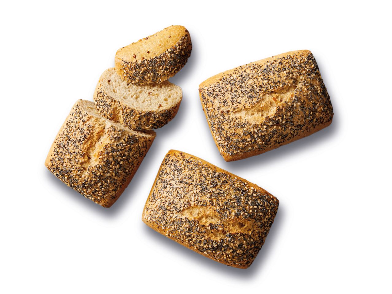 Petits pains aux graines, coupés et entiers.
