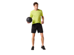 Man in CRIVIT lime green sports shirt and black Men's Sports Shorts holding a basketball.
