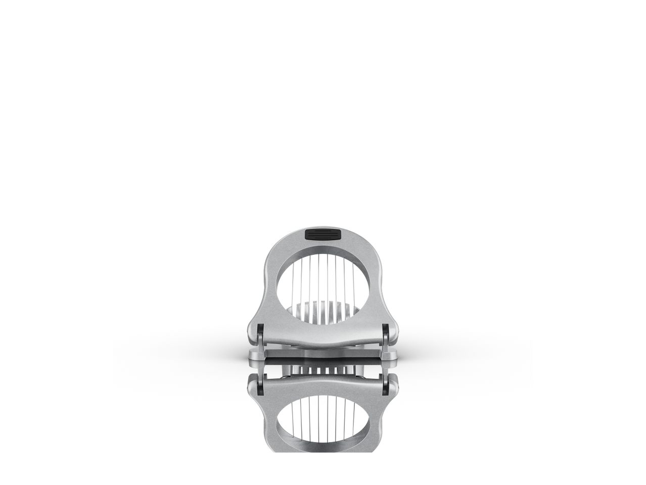 A silver metal clamp, possibly for a firearm or other equipment.