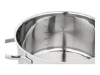 Stainless steel saucepan with measurement markings inside.