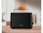 Black Silvercrest toaster with a bread roll on the warming rack.