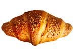 Nut-topped croissant.