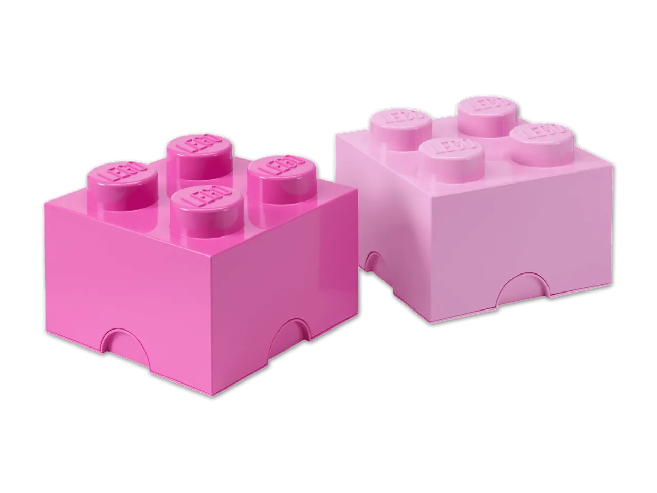 Zwei pinkfarbene Spielzeugbausteine, einer dunkelrosa und der andere hellrosa, auf weißem Hintergrund.