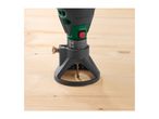 Close-up of a rotary tool with a depth guide and drill bit on a wooden surface.