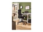 Home office with a black mesh office chair, white desk, and a white bookshelf.