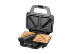 Sort sandwichmaskine med to ristede sandwicher, åben og klar til servering.