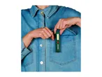 Person in denim shirt putting a green Parkside work light into a pocket