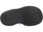 Shoe sole with embossed foot imprints.
