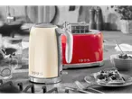 Silvercrest kettle and toaster in a kitchen setting with breakfast items.