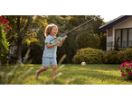 Lupilu Electric Water Pistol in action, a child playing with it in a sunny garden.