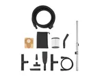 A disassembled cordless vacuum cleaner with various attachments, including a hose, wand, and different cleaning tools.