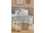 Livarno Microfibre Satin Bedlinen with floral pattern on a bed with decorative pillows.