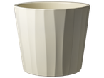 Cream-colored faceted ceramic pot or mug on a black background.