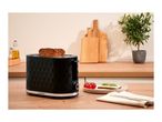 A black textured toaster with two slices of bread on a wooden kitchen counter.
