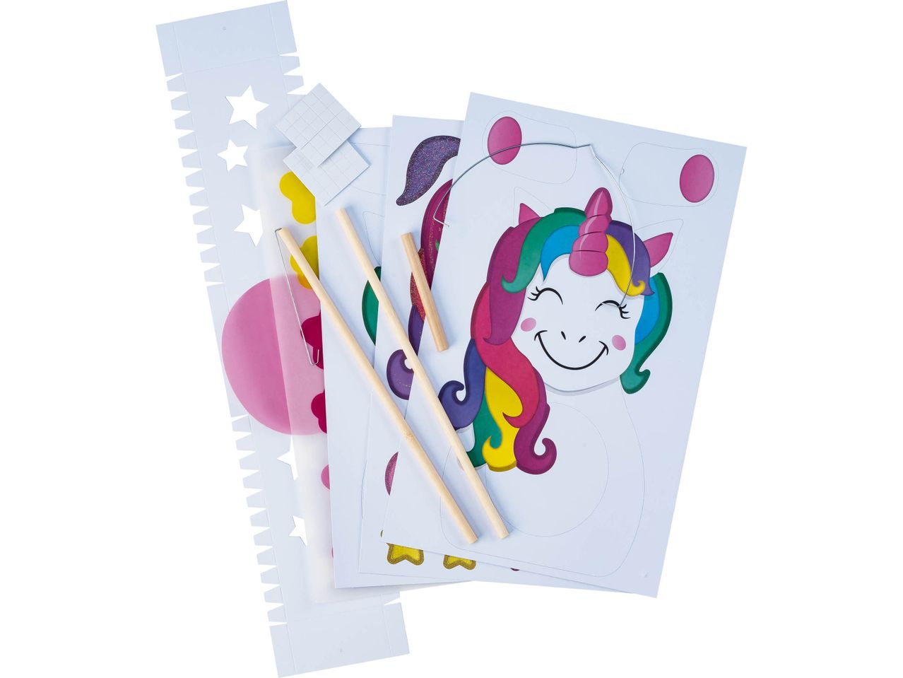 Unicorn lantern craft kit with paper cutouts, wooden sticks, and metal wire.