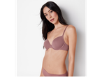 A woman models a Underwired and panties.