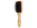 Brosse à cheveux en bois avec des picots noirs, le manche porte l'inscription 'Beauty'.