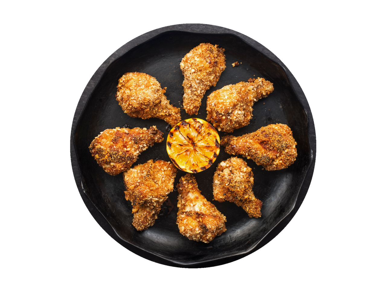 Cepti vistas stilbiņi ar citronu melnā pannā.