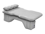 Grey inflatable car air mattress with two pillows, designed for comfortable travel.