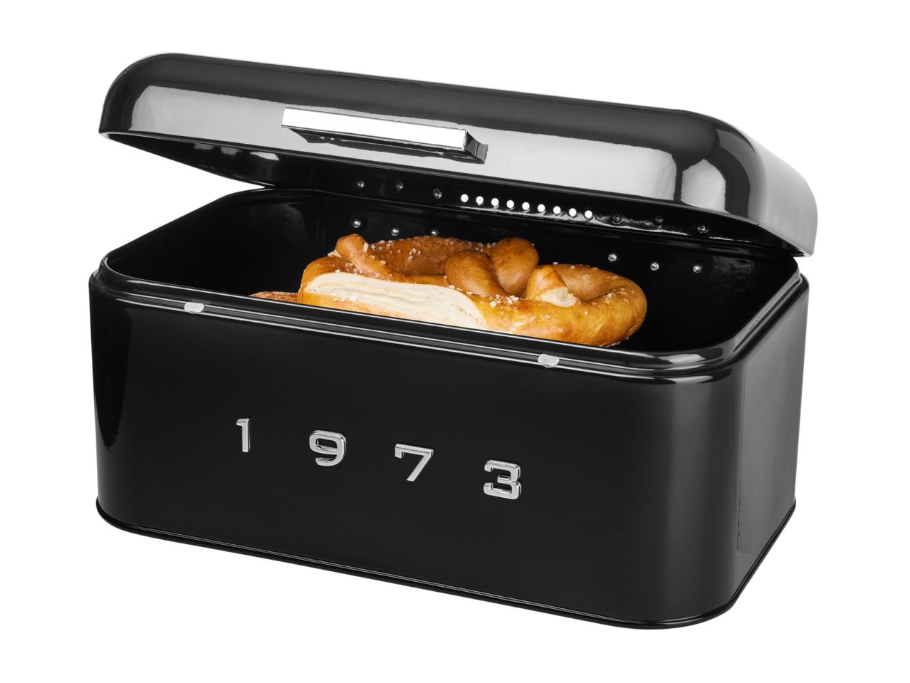 Black retro bread bin with the year 1973 on the front, containing a pretzel