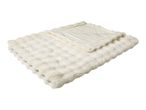Soft cream-coloured faux fur blanket