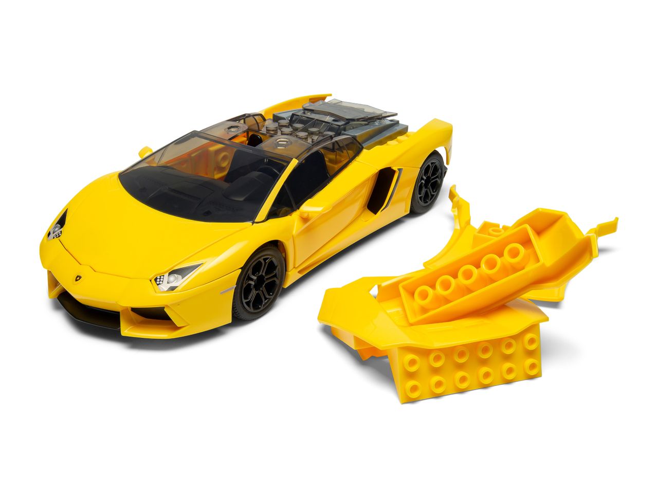 Yellow toy sports car with a partially disassembled chassis on a white background.