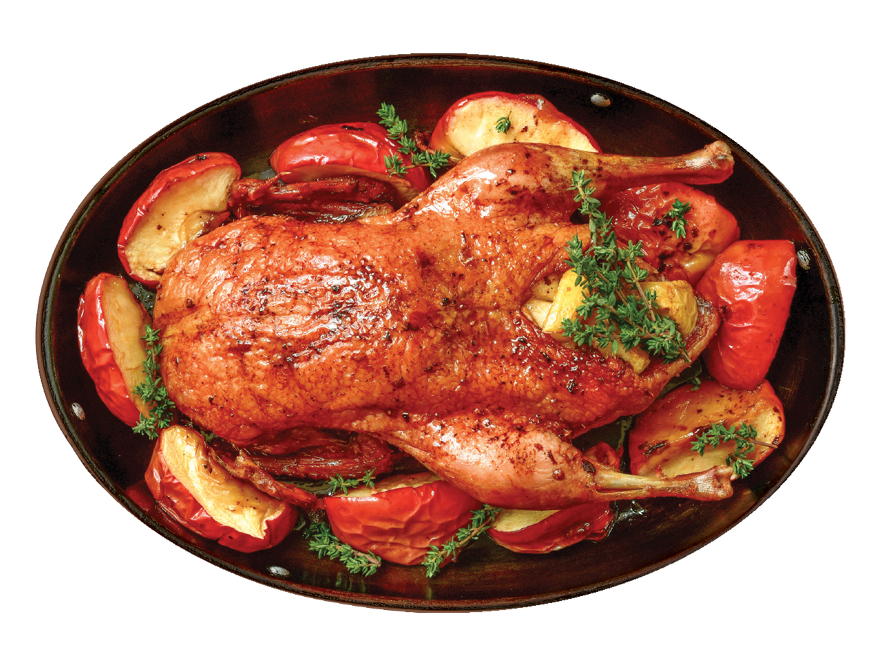 Röstitud part õunte ja tüümianiga ovaalsel taldrikul