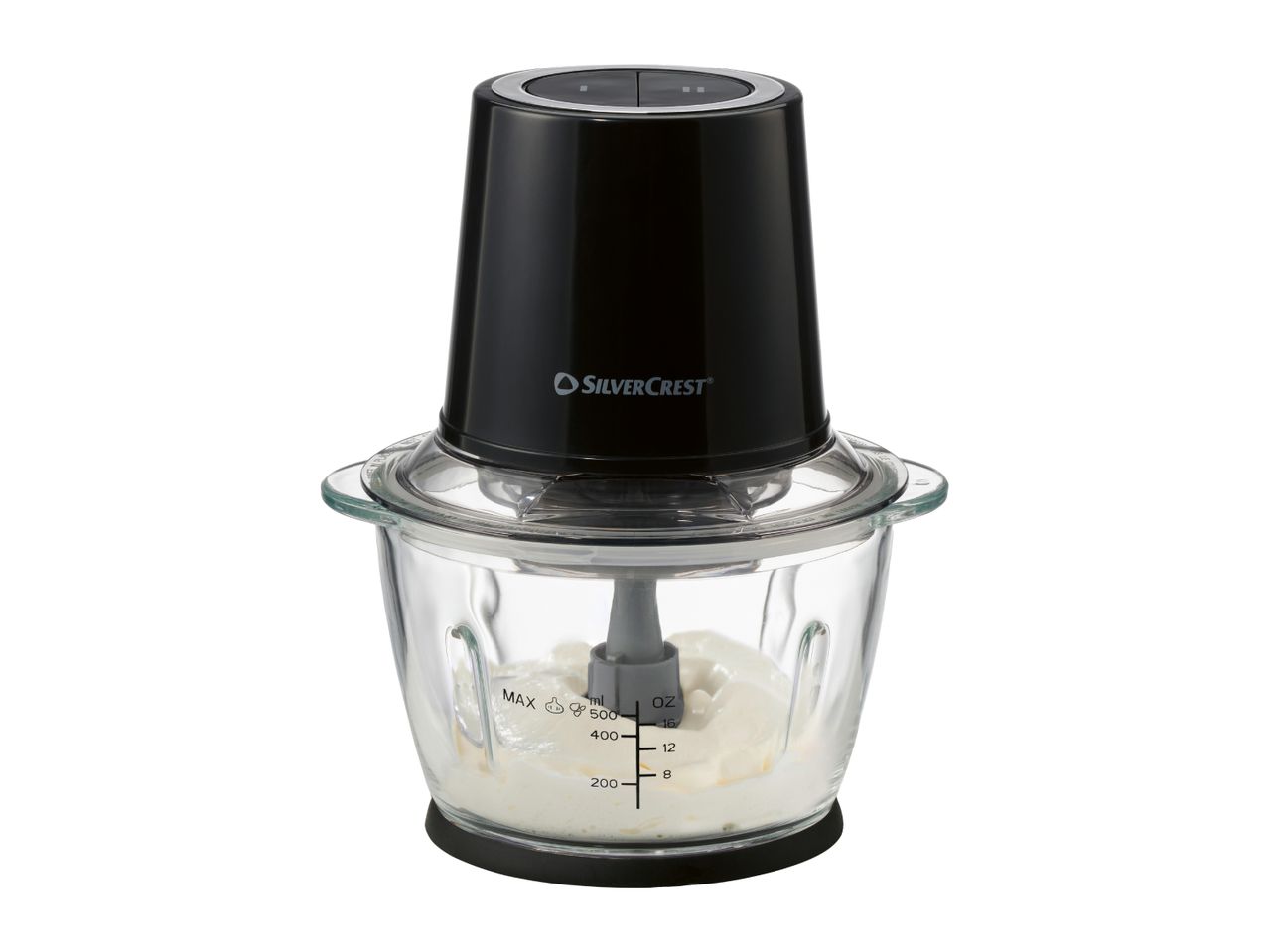 Black and clear glass food chopper with white ingredients inside, on a white background.