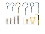 Various metal hooks, screws, wall plugs, and picture hangers on a white background.