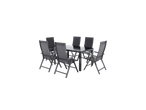 Conjunto de jantar de jardim com mesa cinzenta e seis cadeiras dobráveis.