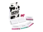 A party game called 'Herd Mentality' with cards, scorepads, and a pink cow figurine.