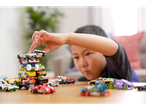 A child plays with Hot Wheels cars.