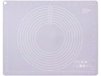 A white plastic baking mat with concentric oval cutouts for crafting.