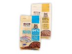 Two Coshidia PureTaste cat food pouches: one with fish, the other grain-free.